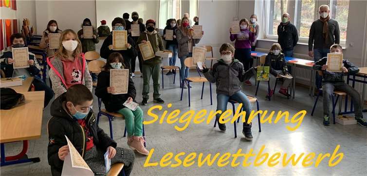 Am nächsten Tag fand der schulinterne Vorlesewettbewerb statt - mit vielen stolzen Gewinnern.