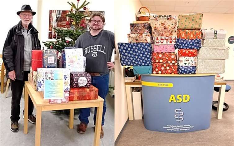 455 Weihnachtspäckchen für notleidende ukrainische Kinder gespendet Das war Spitze: Allein 129 Weihnachtspäckchen konnte Initiator Hans-Jürgen Tlusty von Prokurist Philipp Jäschke in Empfang nehmen, liebevoll gepackt von den Betreuern und Gästen der ASD-Tagespflege in der Linzer Scherer-Passage, unterstützt von deren Angehörigen, Kindern der Kita Hummelnest und Linzer Familien. Foto: ASD
