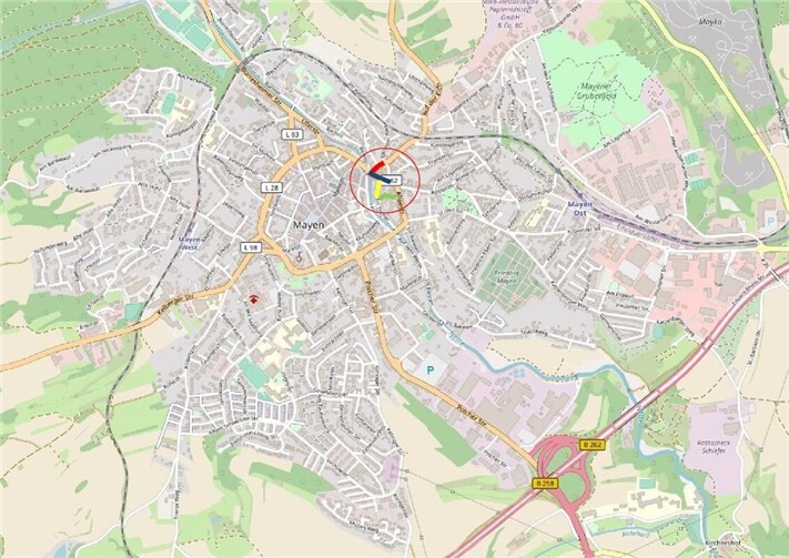 Der zugehörige Lageplan weist die Bauabschnitte wie folgt aus: Bauabschnitt 1 – Auf der Eich (rot), Bauabschnitt 2 – Koblenzer Straße (blau), Bauabschnitt 3 – Im Trinnel (gelb) und Bauabschnitt 4 – Im Trinnel (grün). 