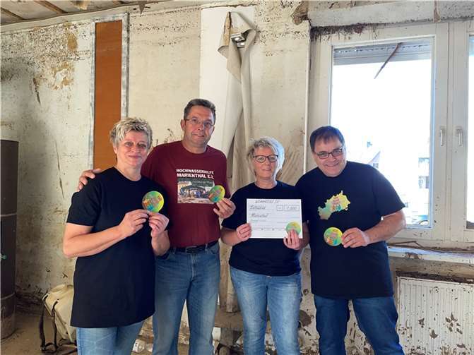 Die Organisatoren des Projekts „WE ARE ONE“ konnten eine Spende von 1.000 Euro an die Hochwasserhilfe Marienthal e.V. überreichen. Foto: privat