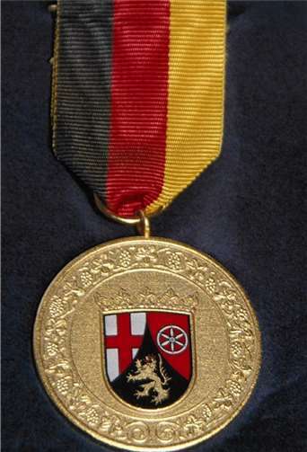 Die Verdienstmedaille des Landes Rheinland-Pfalz.