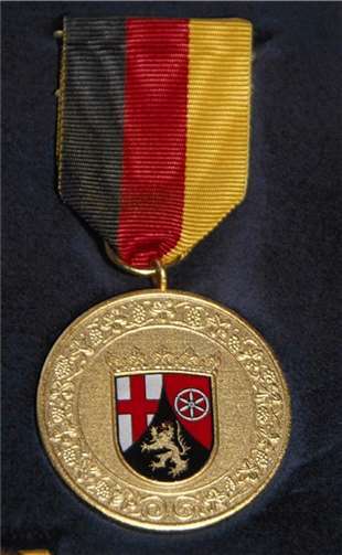 Die Verdienstmedaille des Landes Rheinland-Pfalz.