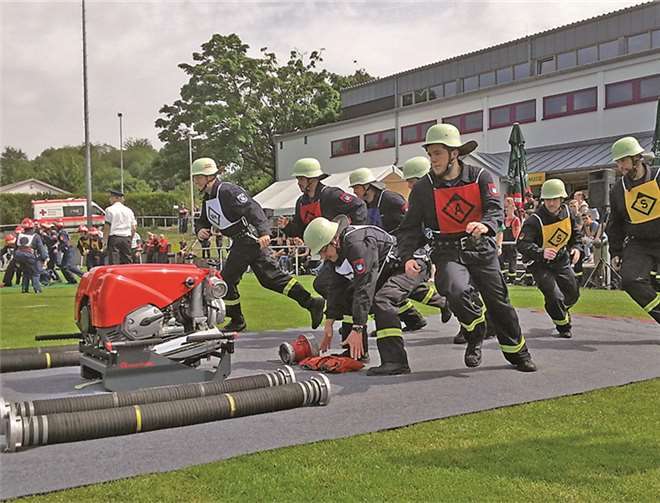 Die Wettkampftruppe der Freiwilligen Feuerwehr Wachtberg im Einsatz bei den Tiroler Landesmeisterschaften in Österreich.