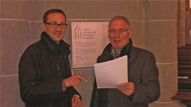 Die beiden Vorsitzenden des Kuratoriums, Dechant Jörg Meyrer und Paul Radermacher, freuen sich über die positive Bilanz. privat