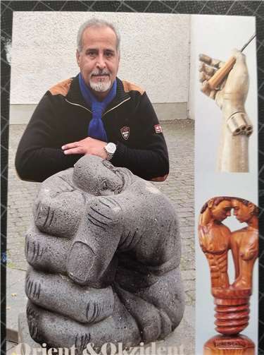 Mo. T. präsentiert vielfältige Kunstwerke Die beim Steinbildhauersymposium in Mendig entstandene Skulptur aus Basalt, die eine Faust mit einem traurig blickenden Mann zeigt, ist auf dem Platz vor dem Alten Arresthaus zu bewundern. Foto: privat