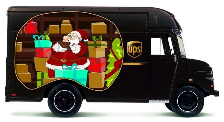 Die braunen Paketfahrzeuge werden zum Christmas Truck für Kinder. UPS Deutschland