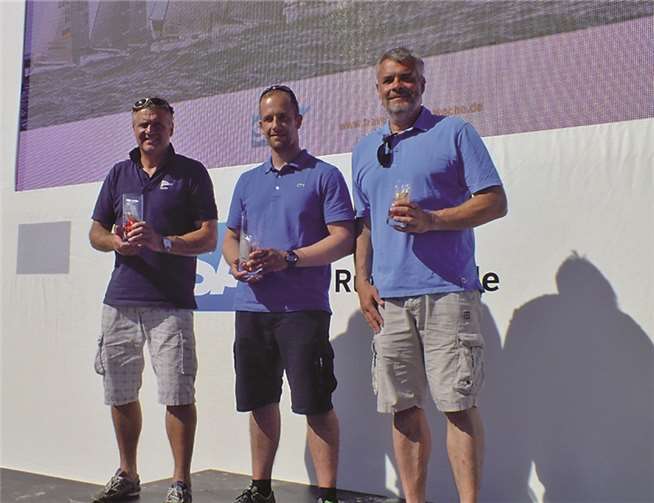 Dirk Meid, rechts, auf dem Podium in Travemünde.privat