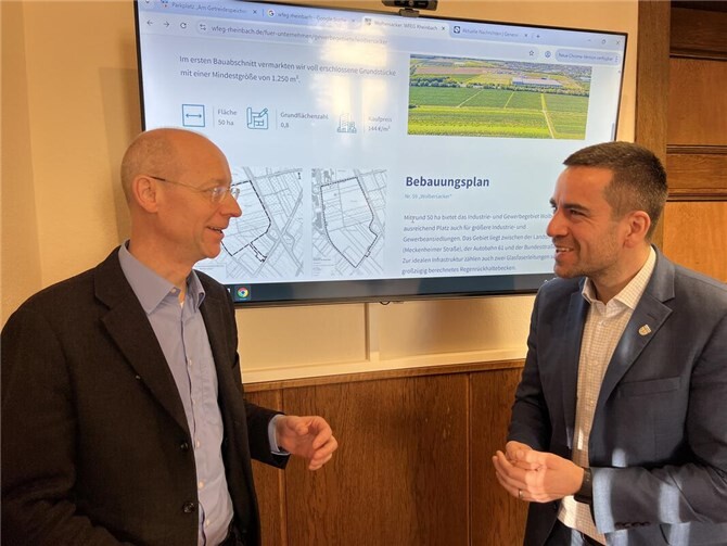 Dr. Joachim Rasch und Bürgermeister Dr. Daniel Phiesel im Austausch,  Foto: Stadt Rheinbach