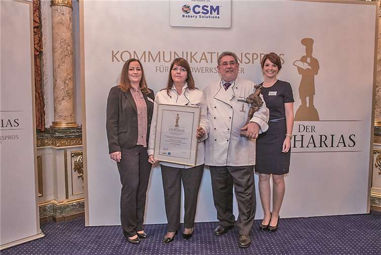 Ellen und Achim Lohner (Mitte) aus Polch bei der Preisverleihung in München. Foto: Charles Diehle