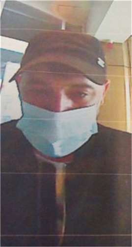Foto-Fahndung: Unbekannter hob mehrfach mit gestohlener Karte Geld ab Foto: Polizei