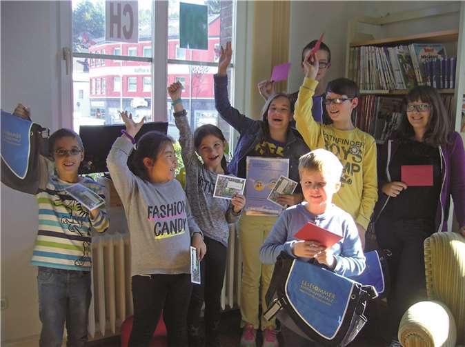 Fröhliche Kinder beim Lesesommer. privat