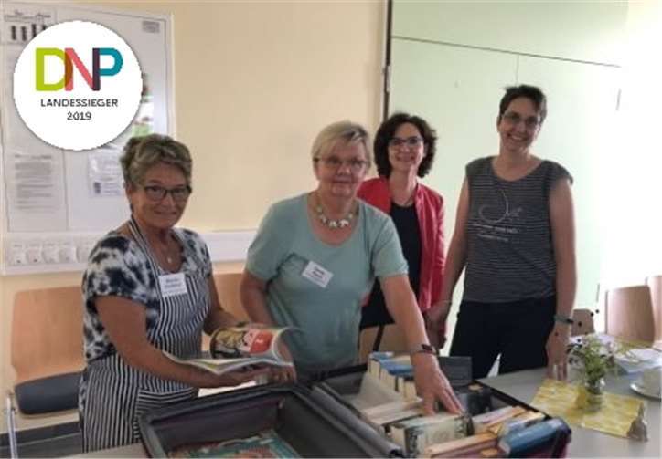 „Gemeinsam statt einsam“ ist das Motto des Quartierprojekts, das die Grafschafter Senior/innen durch ein höchstes Maß an Selbstbestimmung mit zielgenauen Angeboten unterstützt und befähigt. Quelle: Deutscher Nachbarschaftspreis