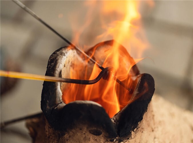 Glasperlenherstellung.