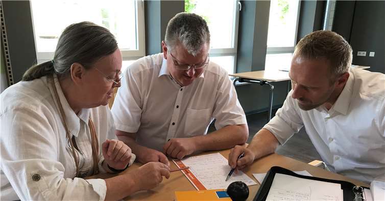 Gruppenarbeit (Susanna Henn, Dr. Tobias Kador, Steffen Becker).