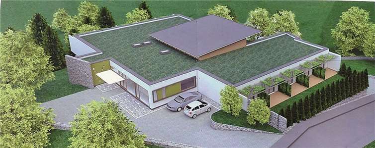 Im Grünen liegt das Hospiz, die Gäste schauen aus ihren Zimmern auf Weinberge.