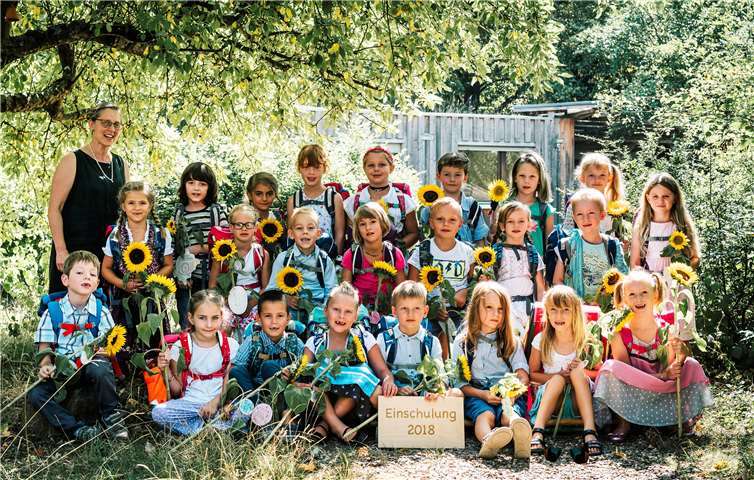 Jedes Kind wurde mit einer Sonnenblume begrüßt. Photoart Klaus Weinand