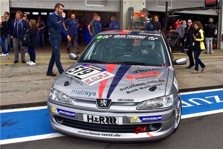 Jürgen Nett mit dem Peugeot 306 S16 bei der Ausfahrt aus der Box beim 39. RCM DMV Grenzlandrennen 