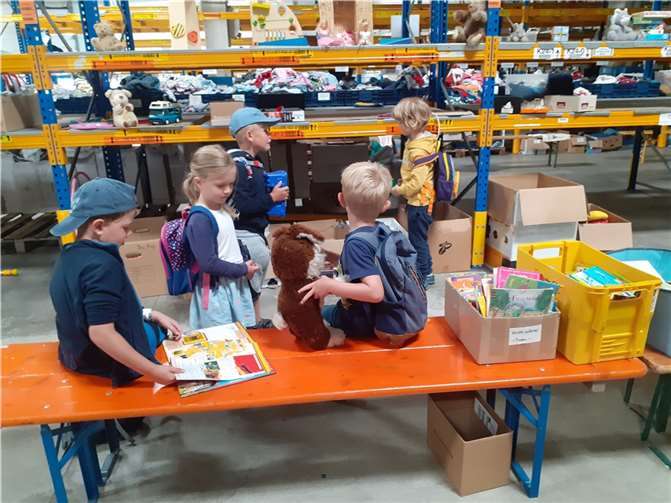 Kinder des Familienzentrums St. Josef besuchen "Meckenheim hilft". Foto: privat