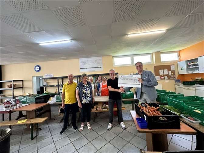 Michael Schmidt, Hiltrud Thull, Alexander Schnupp (alles Tafel) und Thomas Hampf (Rotary) (v. l.) Foto: Rotary Club Montabaur