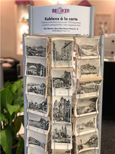 Neben dem aktuellen Motiv sind auch die Bildpostkarten der vergangenen Jahre bei BECKER Hörakustik in der Schloss Str. erhältlich.