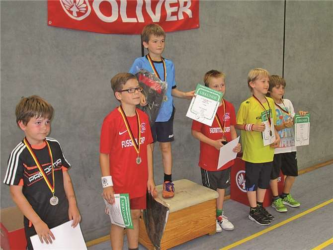 Oliver Klöppel in U 10 (links) bei der Siegerehrung in Trier.privat