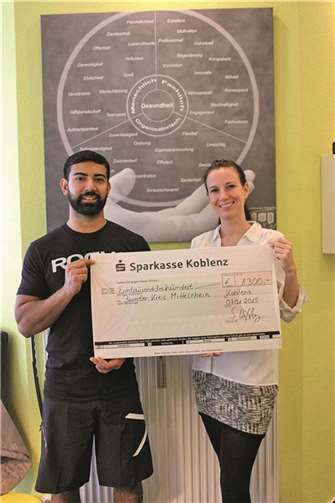 Sabrina Weißelberg mit ihrem Lebensgefährten Kenneth Ortiz, dem Leiter der Koblenzer Praxis. privat