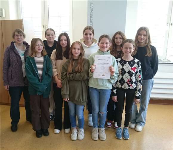 Schüler und Schülerinnen einer 7. Klasse des Rhein-Wied-Gymnasiums Neuwied mit Klassenleiterin Frau Gluth.