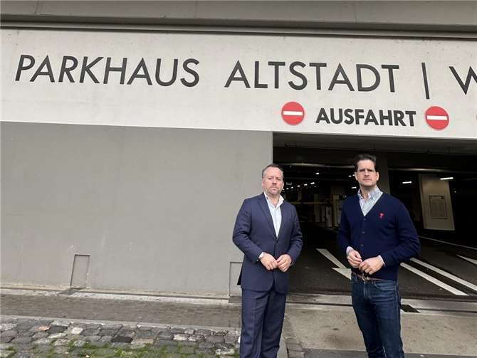 Stephan Wefelscheid und Christian Altmaier vor Tiefgarage in Koblenz.  Foto: Cara Bohnen.