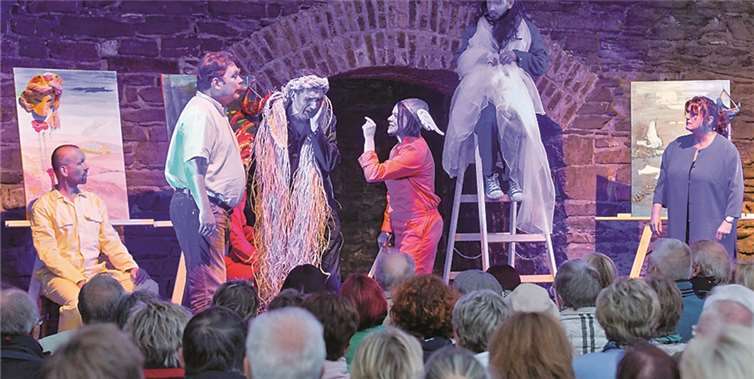 Szene aus dem heiteren Theaterstück.