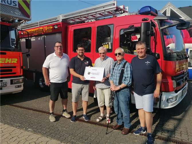 V.li. Geschäftsführer Jürgen Odenthal, Wehrführer Sebastian Still, Beisitzer und Gründungsmitglied Helmut Distelrath, Ehrenvorsitzender Hermann-Josef Diekmann, Beisitzer Christoph Bast. Foto: Sebastian Still