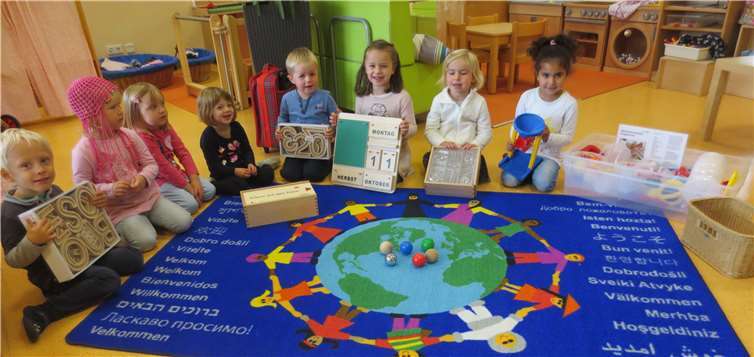 Zufriedene Kinder der Kita-Goethe Knirpse Remagen mit den neuen Spielsachen. Privat