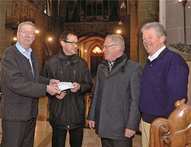 v.l. Wilbert Herschbach, Dechant Jörg Meyrer, Paul Radermacher und Bernd Schrading.Fix